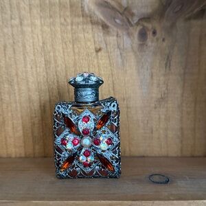 Rare. Vintage. Collectible. Decorative Silver and Red Perfume Bottle.